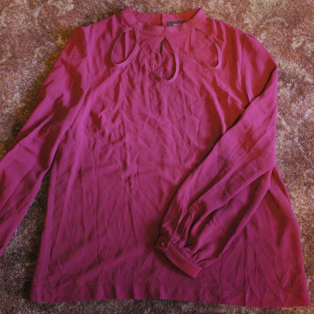 Burgundy blouse with peek a boo cut